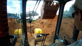 Excavators Backfilling and Compacting Pipe [upl. by Dalenna]