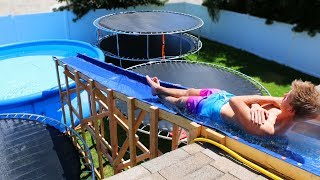 GIANT Backyard Water Slide in our Trampoline Water Park [upl. by Au]