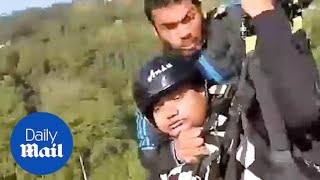 Hero pilot saves man after their paraglider SNAPS mid air [upl. by Waugh]