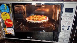 Microwave oven me pizza banane ka tarika microwave me pizza kaise banaye [upl. by Idelson318]